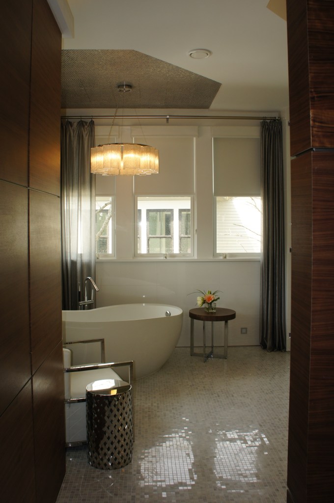 As you enter the Master Bathroom, the first thing you see is the inviting bathing area.
