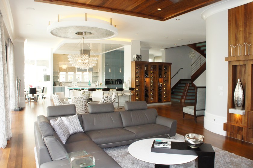 Here you can see how the lightness of the room can handle the darkness and weight of the charcoal gray leather sectional.  