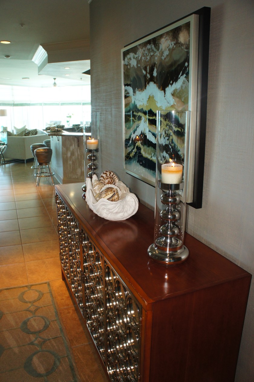 This entry console was the only original piece of furniture we kept by the end of the remodel.  We think we breathed in it some new life here!