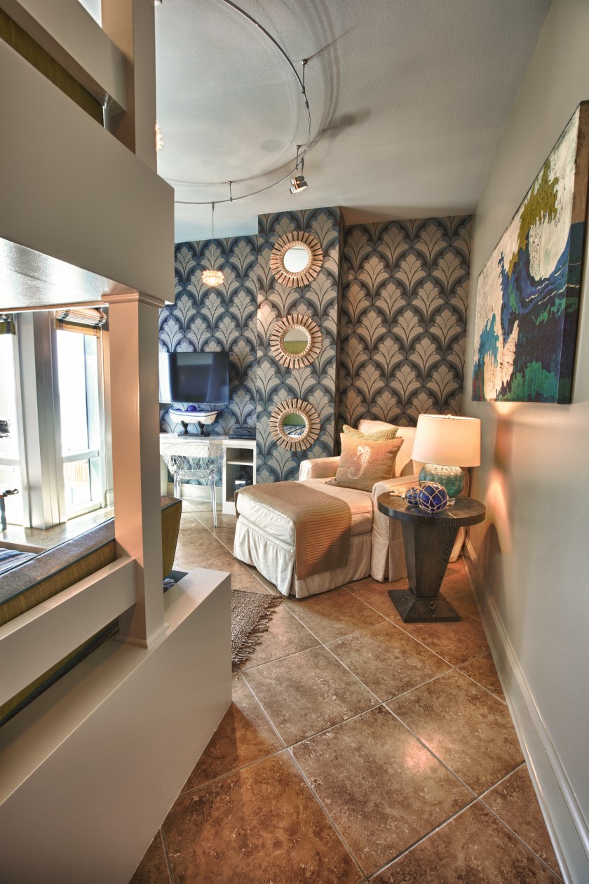 This blue printed wallcovering brought weight and emphasis to the other side of the room.  It was the perfect backdrop for the chaise lounge and white built-in desk. 