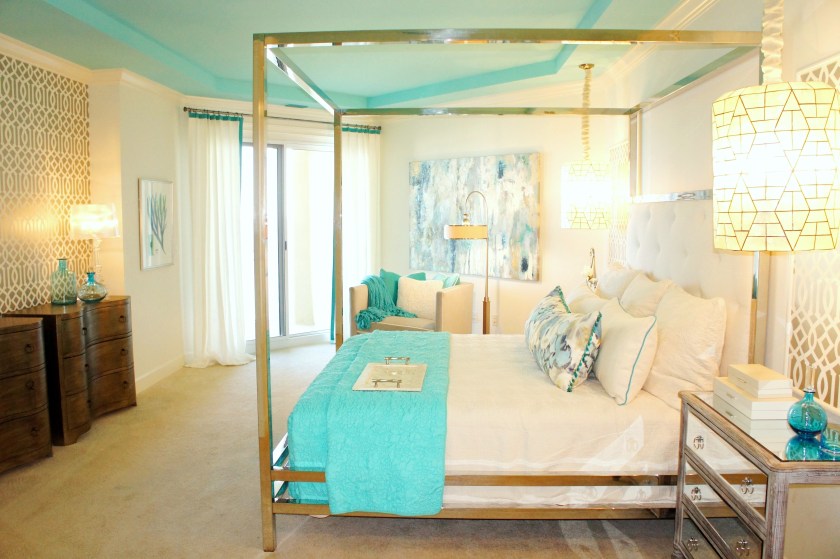 Here you can see how I repeated the metallic geometric wallcovering in the niche across from the bed.  