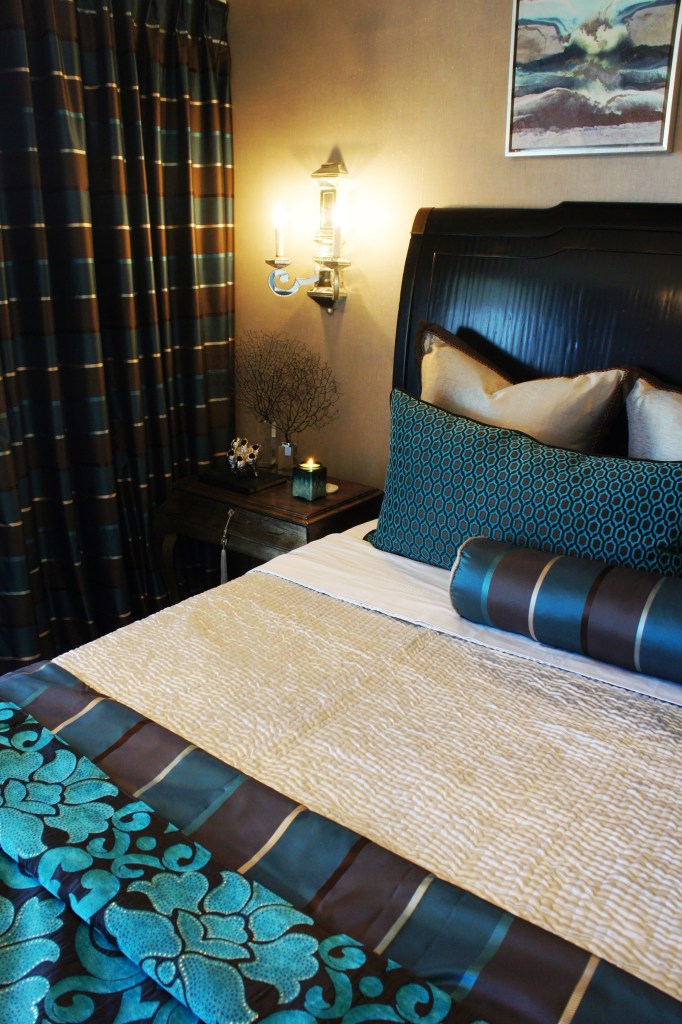 The striped fabric is a great faux silk by Maxell Fabrics, and the blue floral and geometric is by Clarke and Clarke Fabrics.  