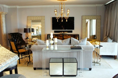 When the walls were gold, everything in the room will had a yellow tint.  The new gray walls neutralized that effect, and allowed my gold accents to have more impact.