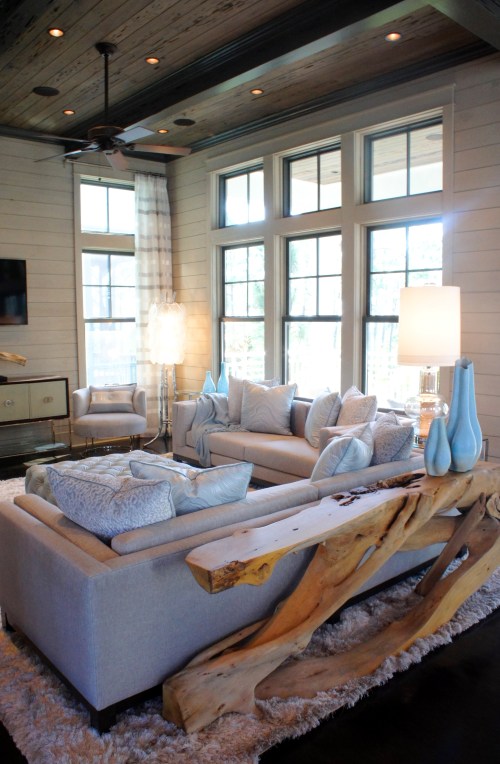 The organic root console table added a rustic element, and some visual interest that helps separate the two seating areas.