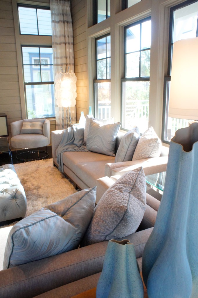 In the corner, I added a unique murano glass leaf floor lamp by Global Views for ethereal light and a sculptural element.