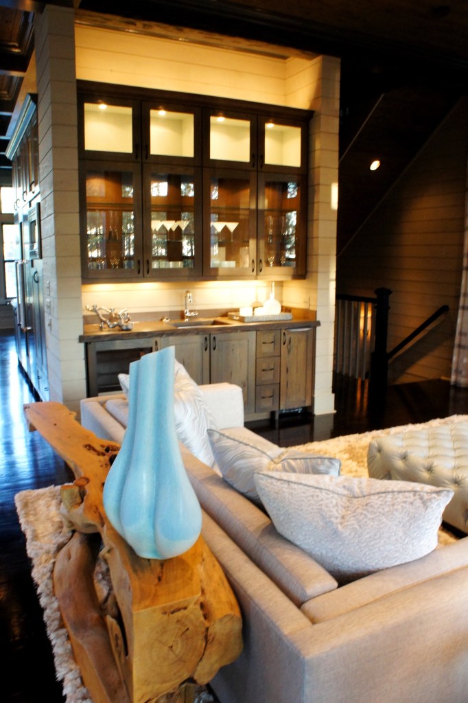 Here you can see how beautifully the lighting around the wet bar glows and complements the blue accents.