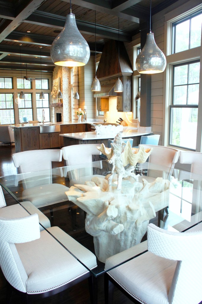 The resin pedestal base was molded to resemble a tree root, and painted white. I thought this would look wonderful contrasted against the dark floors.