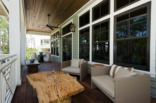 The original builder left me a few stunning, unique pieces of furniture. made from beautiful slabs of pecky cypress and other woods.  This table made a great cocktail table on the balcony!!  The color complements all the greiges and neutral colors.  