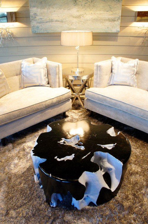 This is a rare cocktail made from tree root that I had stained dark like the floors, and then painted ice blue on the insides of the roots.  This acted as an artistic sculpture, as well as a cocktail table.