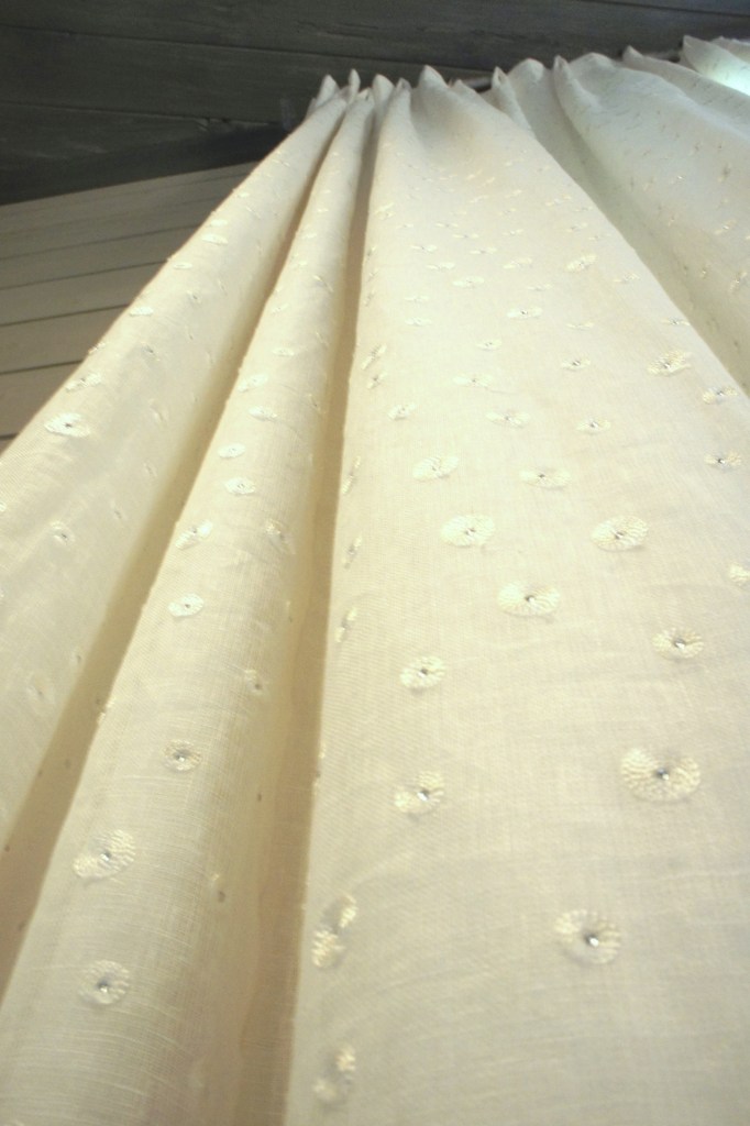 I chose this drape fabric, because it has small rhinestone accents that subtly glint and sparkle when the lights are on!