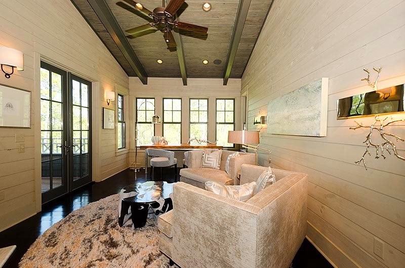 Over the two chairs, is a piece of art I commissioned local artist Allison Wickey to paint. This art is flanked by some fabulous nickel twig sconces by Global Views.