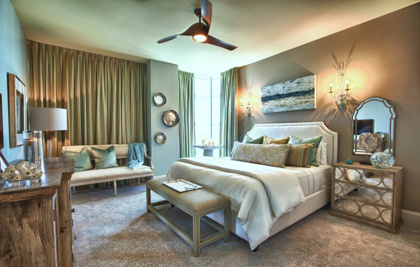 This Second Master we made lighter and more coastal, with its white linen duvet, linen headboard, and softer accents.