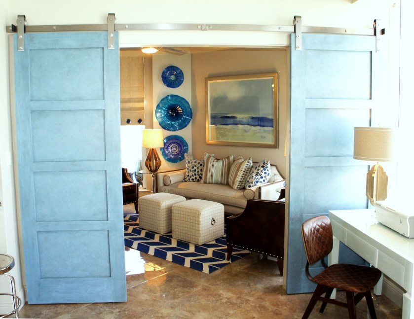 Peeking through the barn doors, is a surprise burst of cobalt!  I wanted this room, which overlooks the bay, to have darker blues, but still blend with the rest of the unit.  