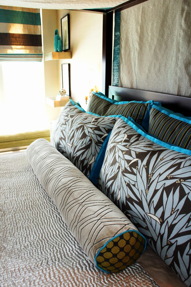 I like to mix patterns and textures when designing custom bedding.  A botanical fabric works great with stripes and geometric patterns! Linens can be mixed with satin, velvet, and shimmering linen blends, with metallic threading. 