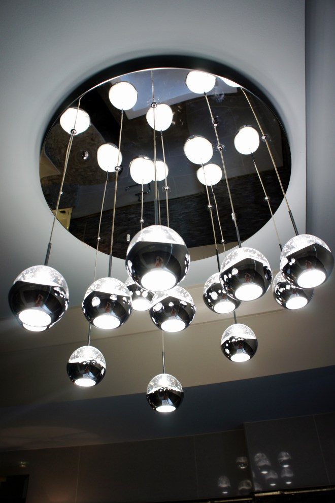 Here is the chandelier I used, which is the "Ice" 13-light pendant manufactured by Eurofase.