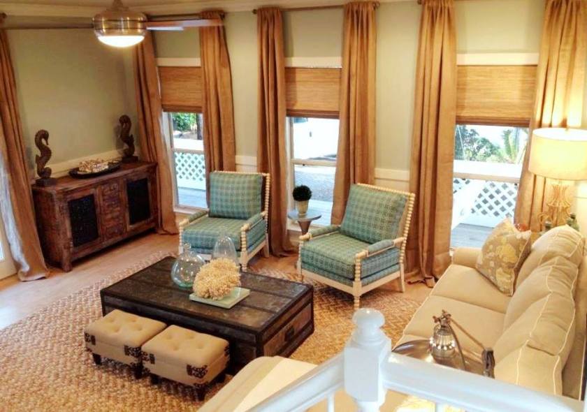 AFTER: After I took this photo, we mounted a television on the wall above the console. This opened the space up and allowed for a larger t.v.