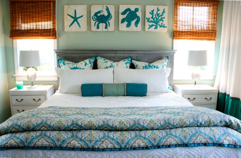 The bolster pillow is made out of two different fabrics (teal and aqua), and a whimsical jute ball fringe! The cute little turtle lamps were a must-have!