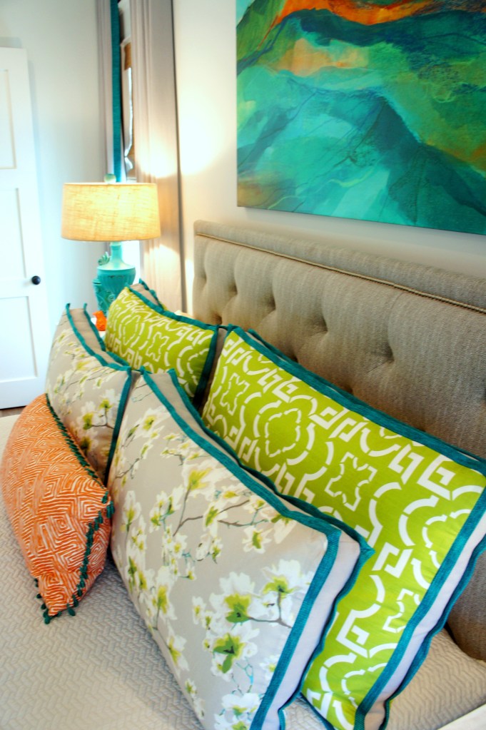 I love to mix florals with geometrics when choosing fabrics. It's always fun to throw in one unexpected color (in this case, orange), to liven things up!